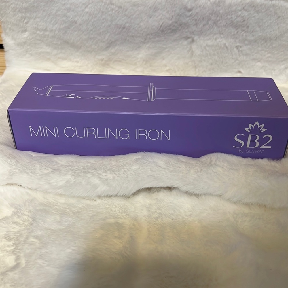 Brand new mini curling iron